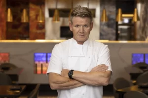 Gordon Ramsay in white chef jacket promoting Hell’s Kitchen Ibiza