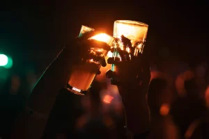 Guests toasting with drinks in Ibiza club